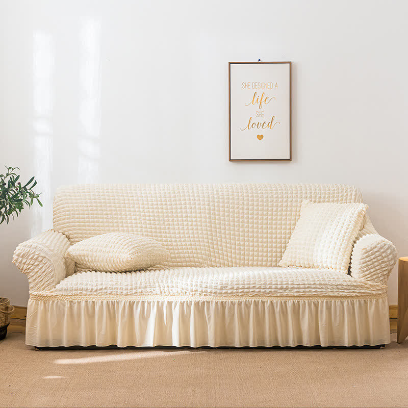 Sofa cover with a ruffle