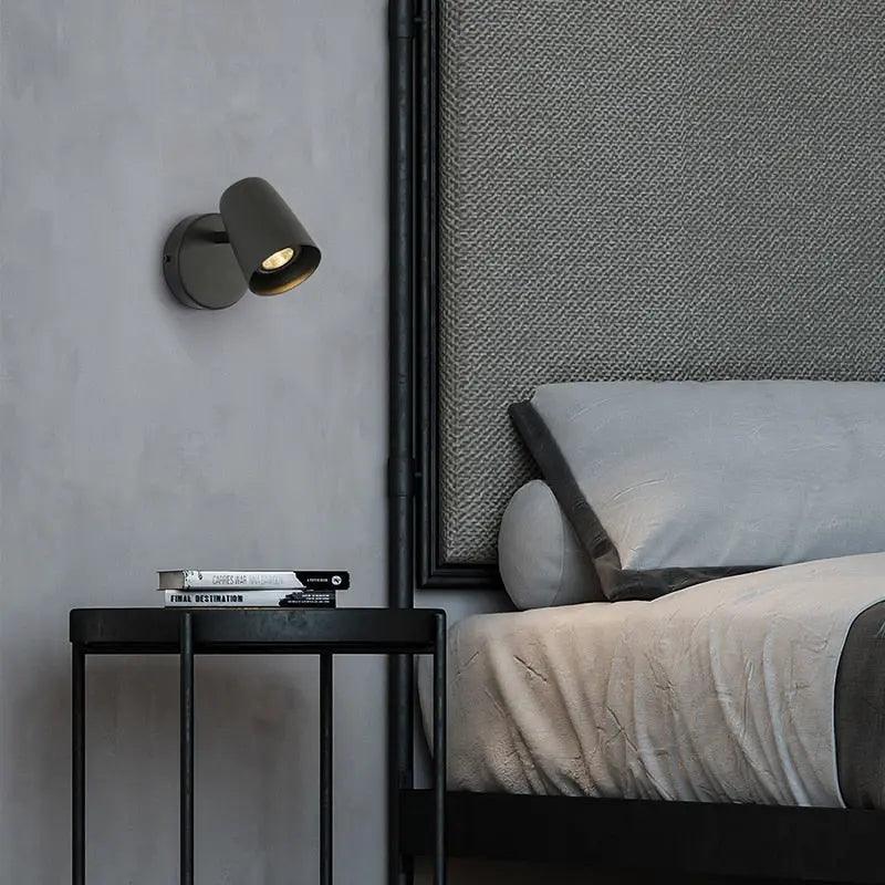 Adjustable wall sconce