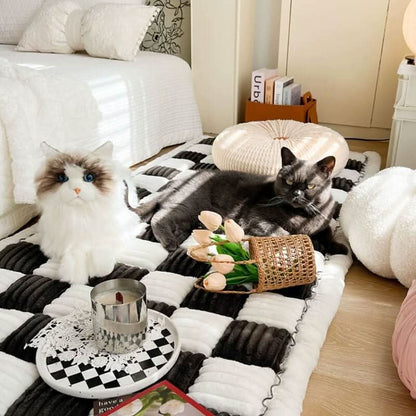 Pet blanket with a non-slip underside