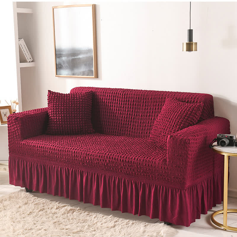 Sofa cover with a ruffle