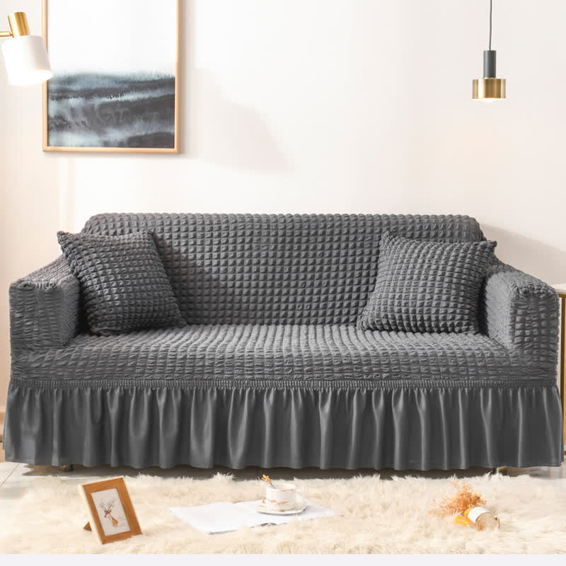 Sofa cover with a ruffle