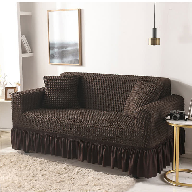Sofa cover with a ruffle