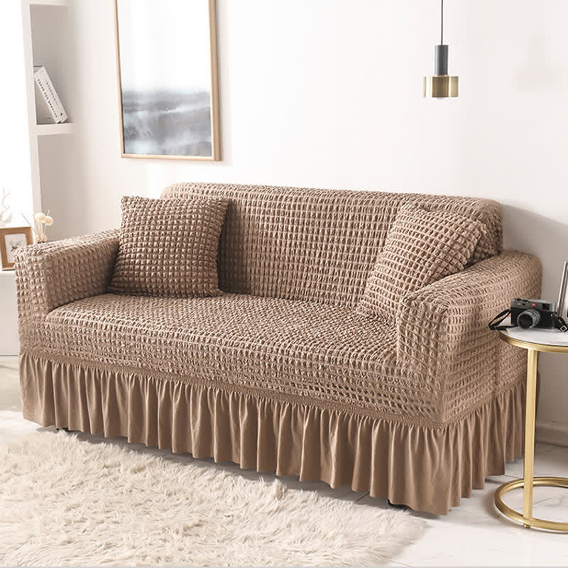Sofa cover with a ruffle