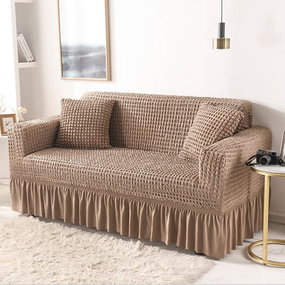 Sofa cover with a ruffle