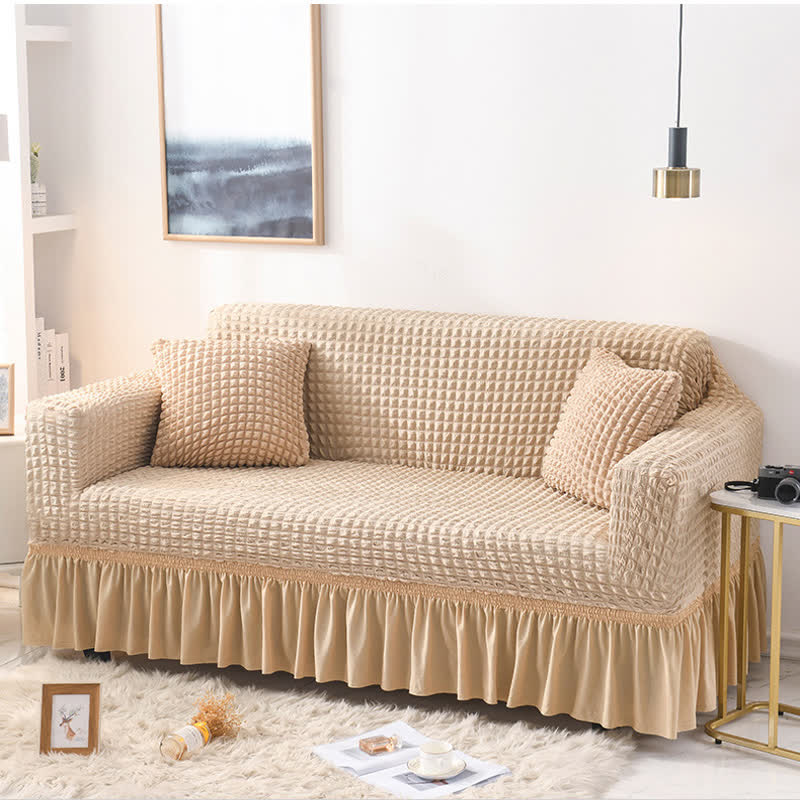 Sofa cover with a ruffle