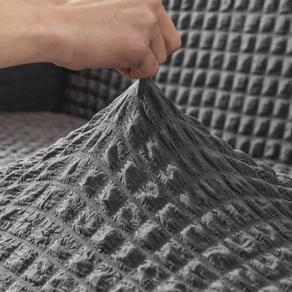 Sofa cover with a ruffle