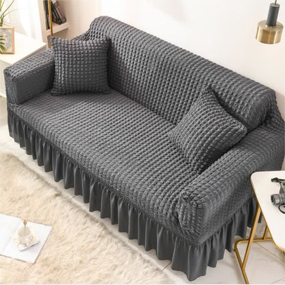 Sofa cover with a ruffle