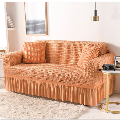 Sofa cover with a ruffle