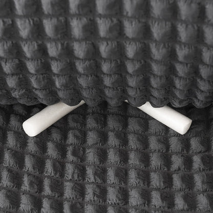 Sofa cover with a ruffle
