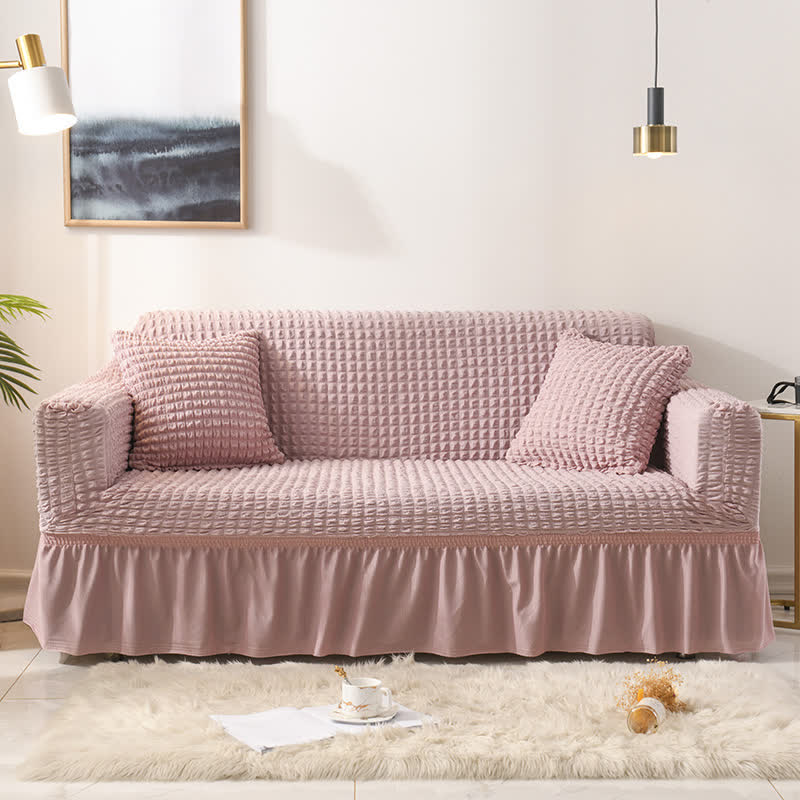 Sofa cover with a ruffle