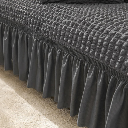 Sofa cover with a ruffle