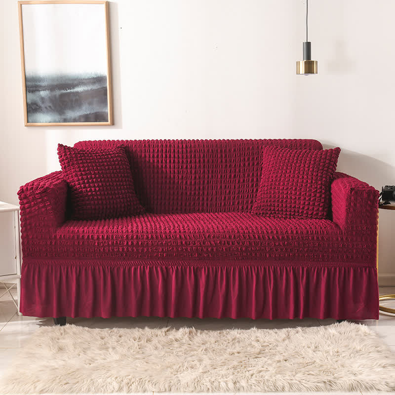 Sofa cover with a ruffle