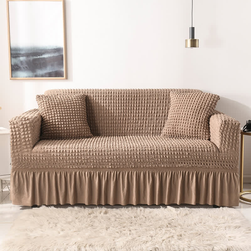 Sofa cover with a ruffle