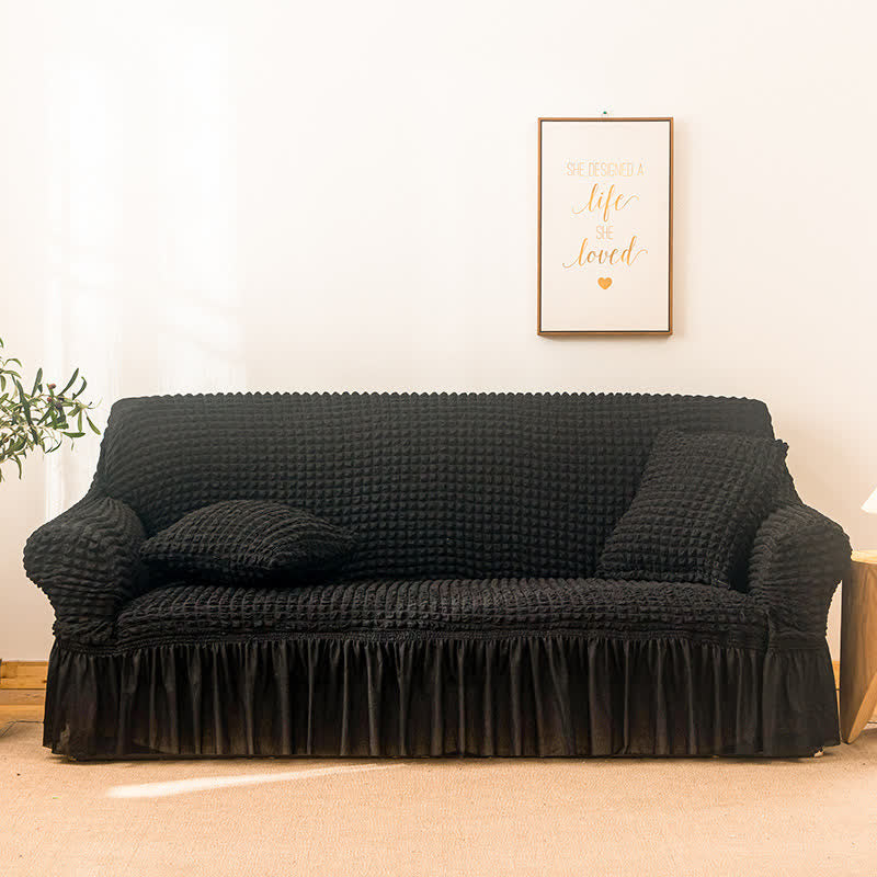 Sofa cover with a ruffle