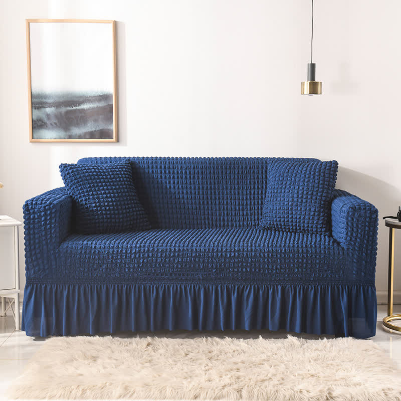 Sofa cover with a ruffle