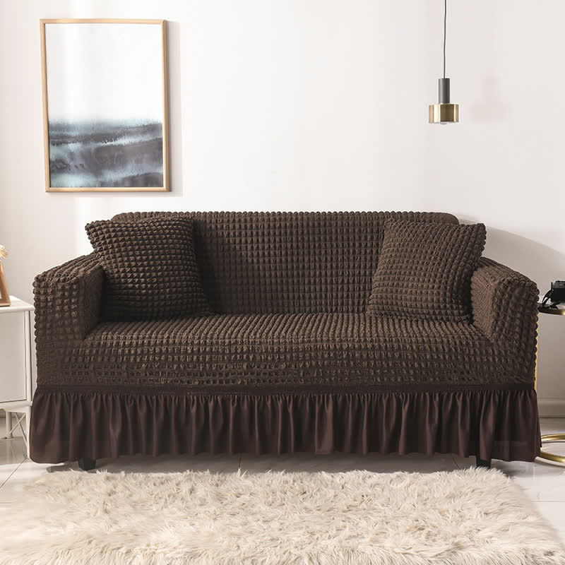 Sofa cover with a ruffle