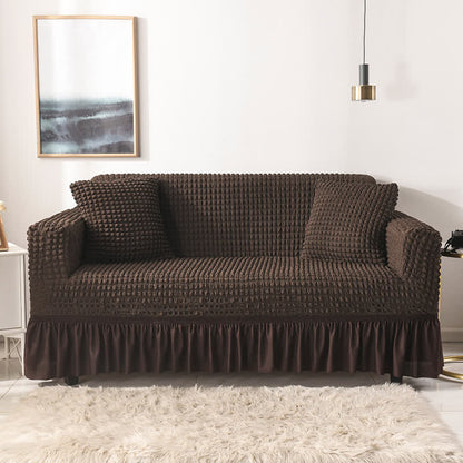 Sofa cover with a ruffle