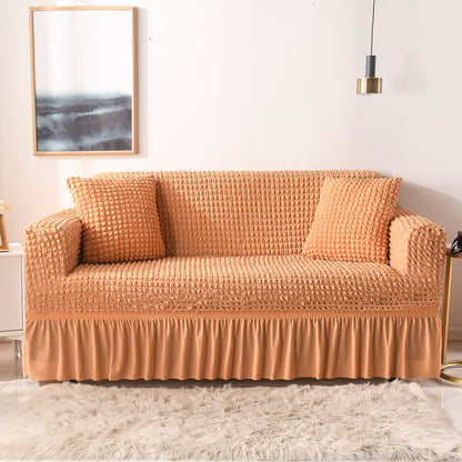 Sofa cover with a ruffle