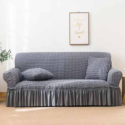 Sofa cover with a ruffle