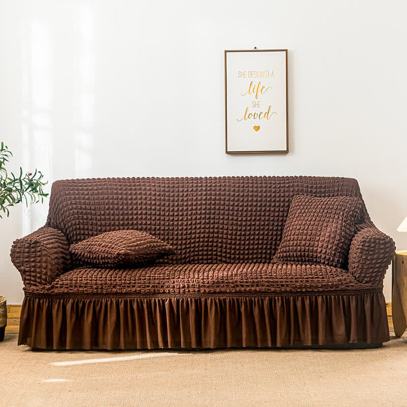 Sofa cover with a ruffle