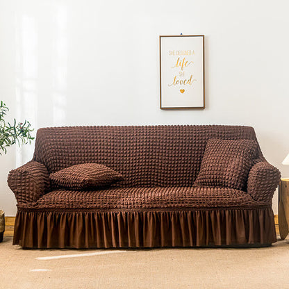 Sofa cover with a ruffle