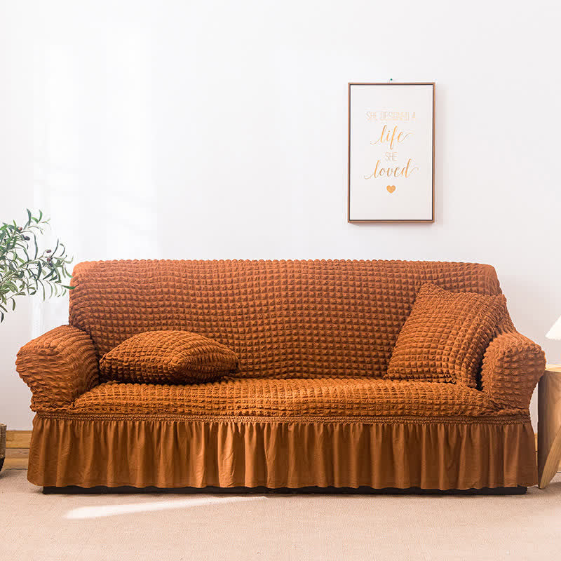 Sofa cover with a ruffle