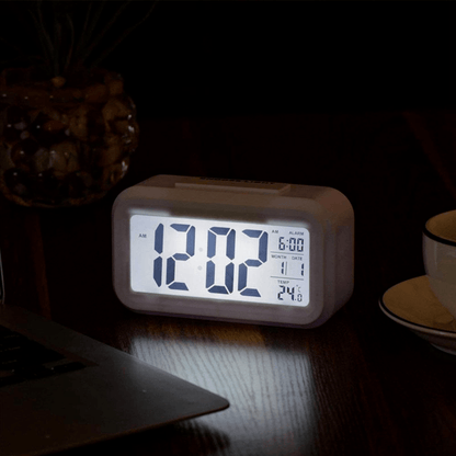 Alarm clock with music alarm and temperature display