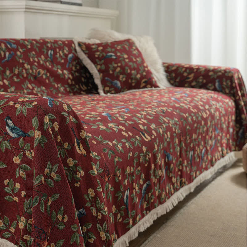 Housse de canapé avec des fleurs et des oiseaux