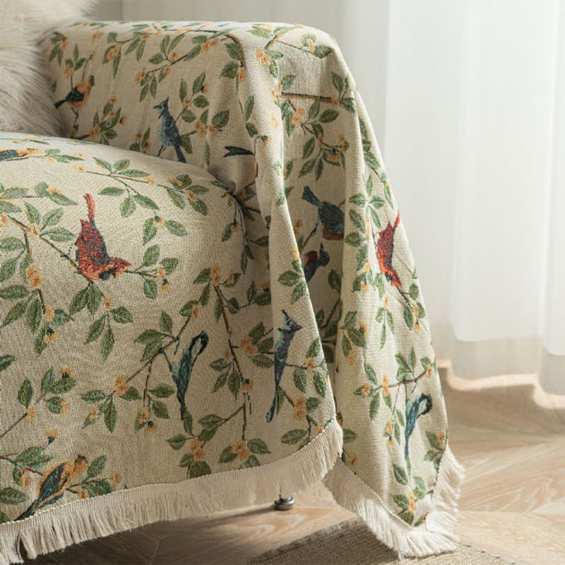 Housse de canapé avec des fleurs et des oiseaux