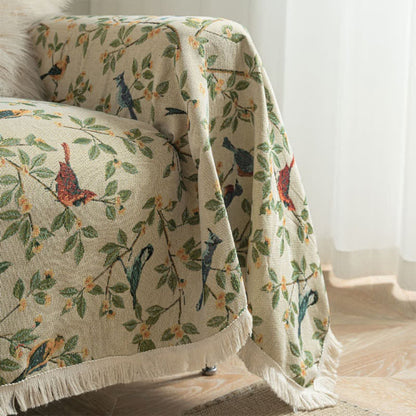 Housse de canapé avec des fleurs et des oiseaux