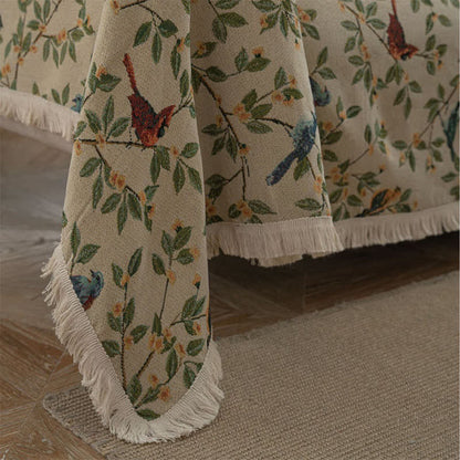 Housse de canapé avec des fleurs et des oiseaux