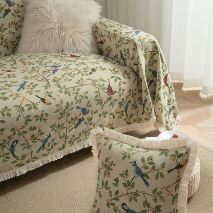 Housse de canapé avec des fleurs et des oiseaux