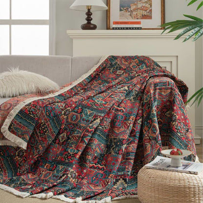 Ethnic sofa cover with tassels