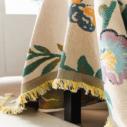 Sofa cover with tassels
