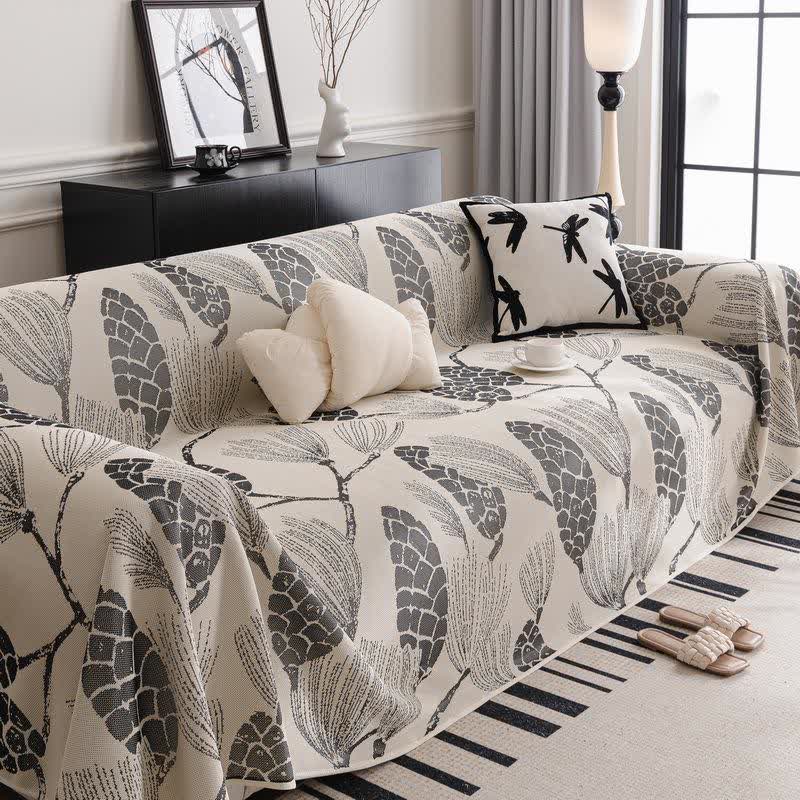 Sofa cover with pinecones