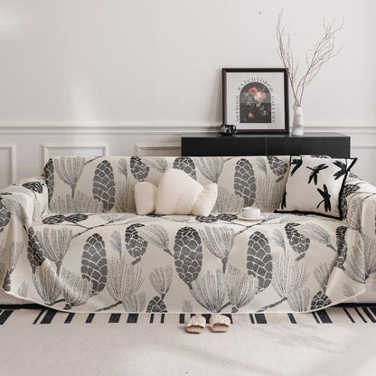 Sofa cover with pinecones