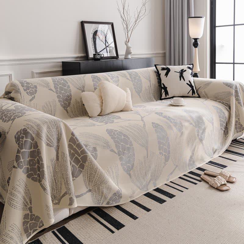 Sofa cover with pinecones