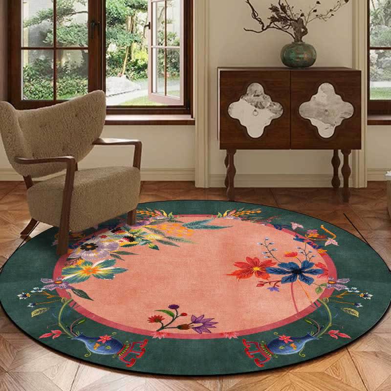 Round floral rug with a coral accent