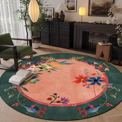 Round floral rug with a coral accent