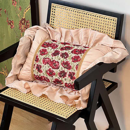 Coussin floral à volants