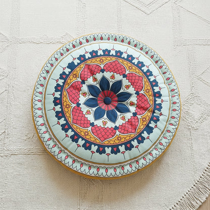 Coussin rond mandala avec des feuilles