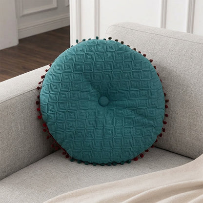 Coussin rond avec bouton fait main