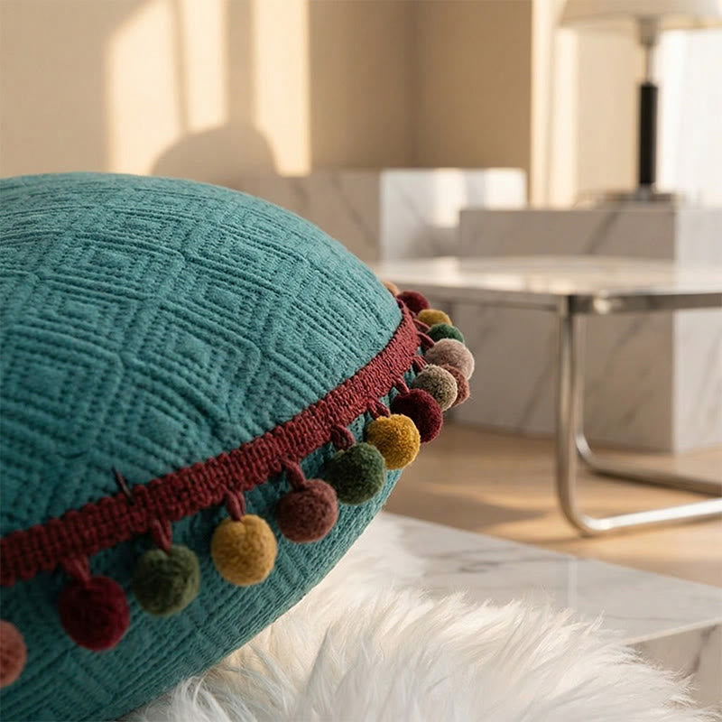 Coussin rond avec bouton fait main