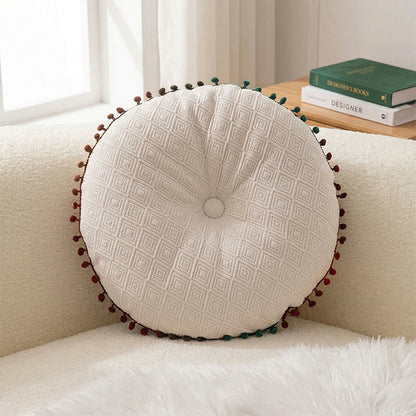 Coussin rond avec bouton fait main