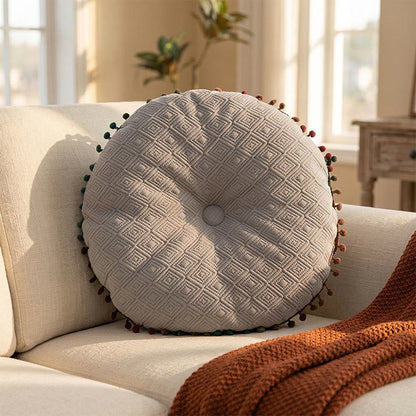 Coussin rond avec bouton fait main