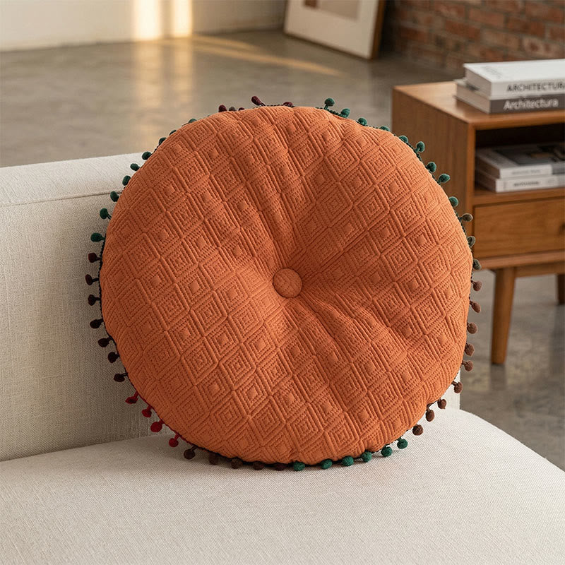 Coussin rond avec bouton fait main