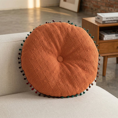Coussin rond avec bouton fait main