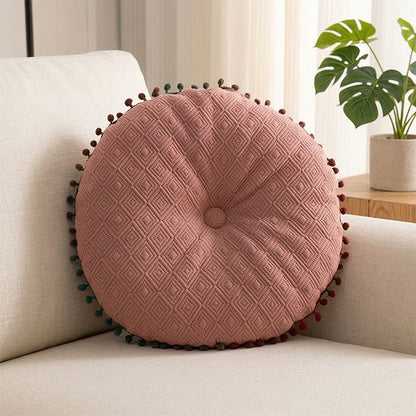 Coussin rond avec bouton fait main