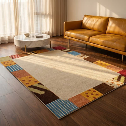 Patchwork rug with a washable border