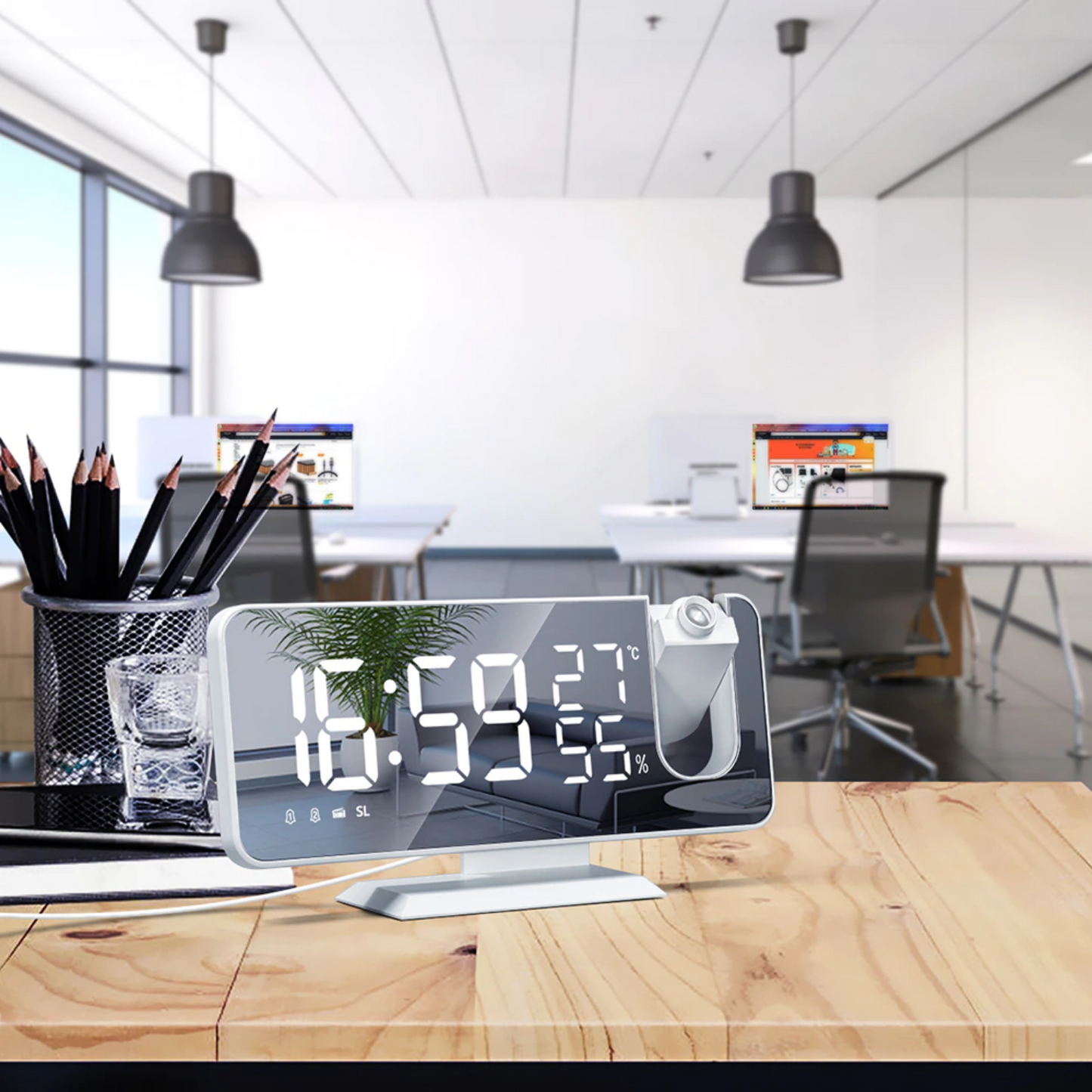 Alarm clock with a projector and climate sensor